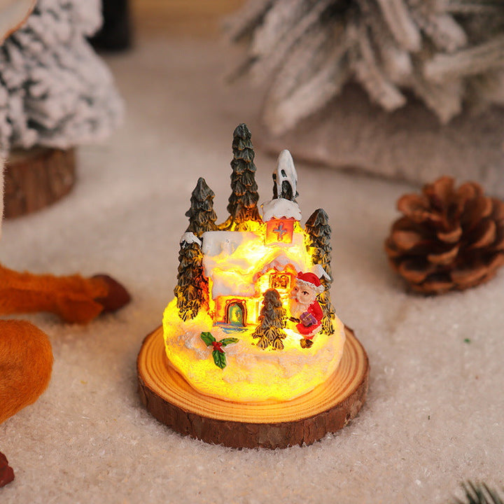 Christmas miniature lighting with snow scenes