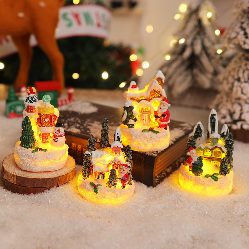 Christmas miniature lighting with snow scenes