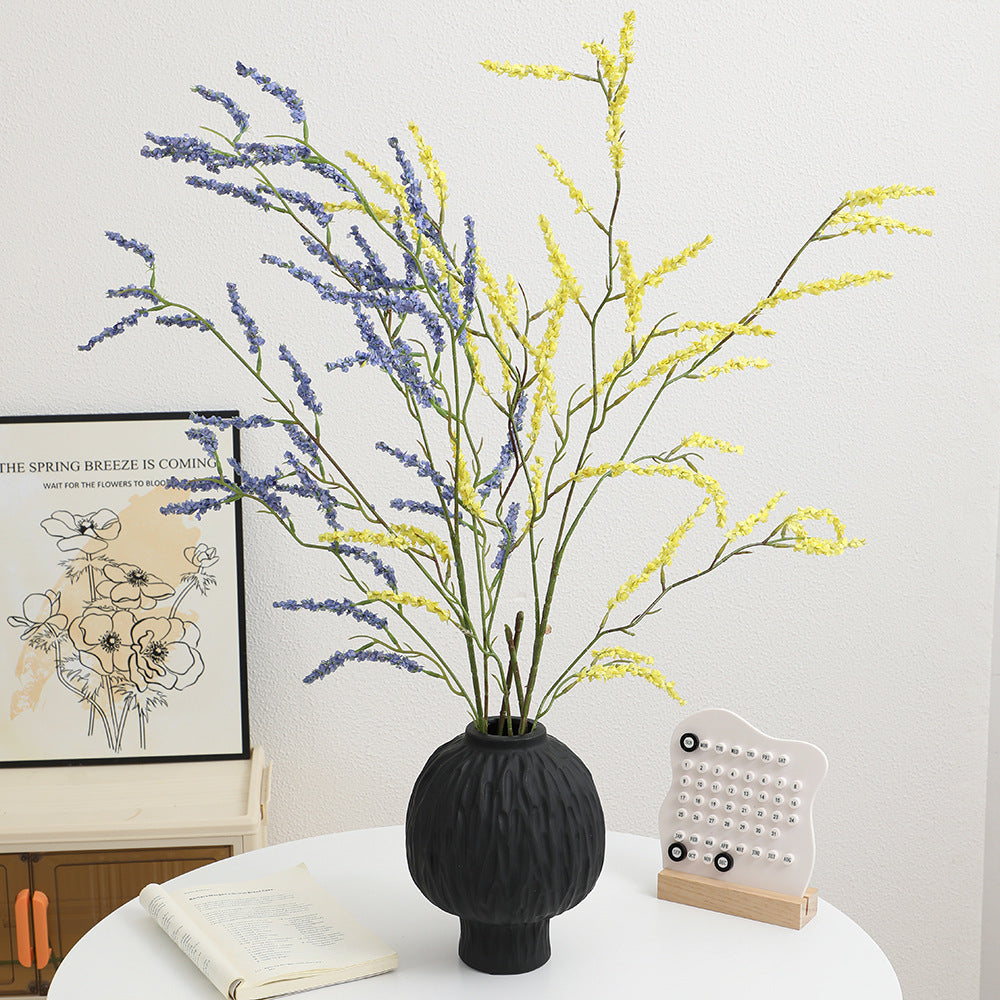 Artificial flower branch with fine pink flowers