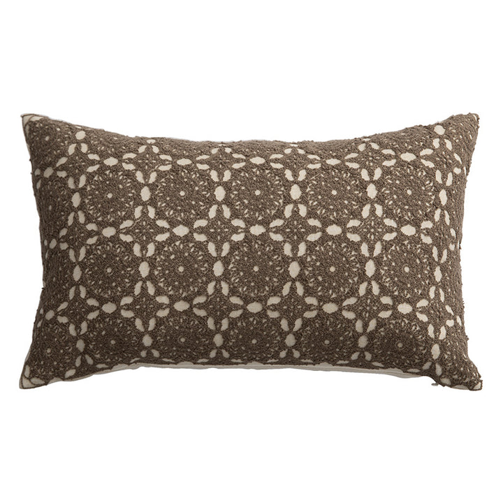 Square decorative cushion with crocheted ornament overlay and linen texture