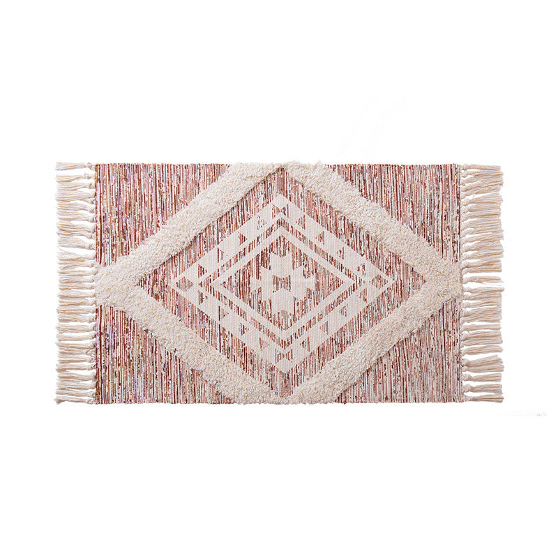 decorative woven bathroom runner with botanical jacquard pattern and fringes