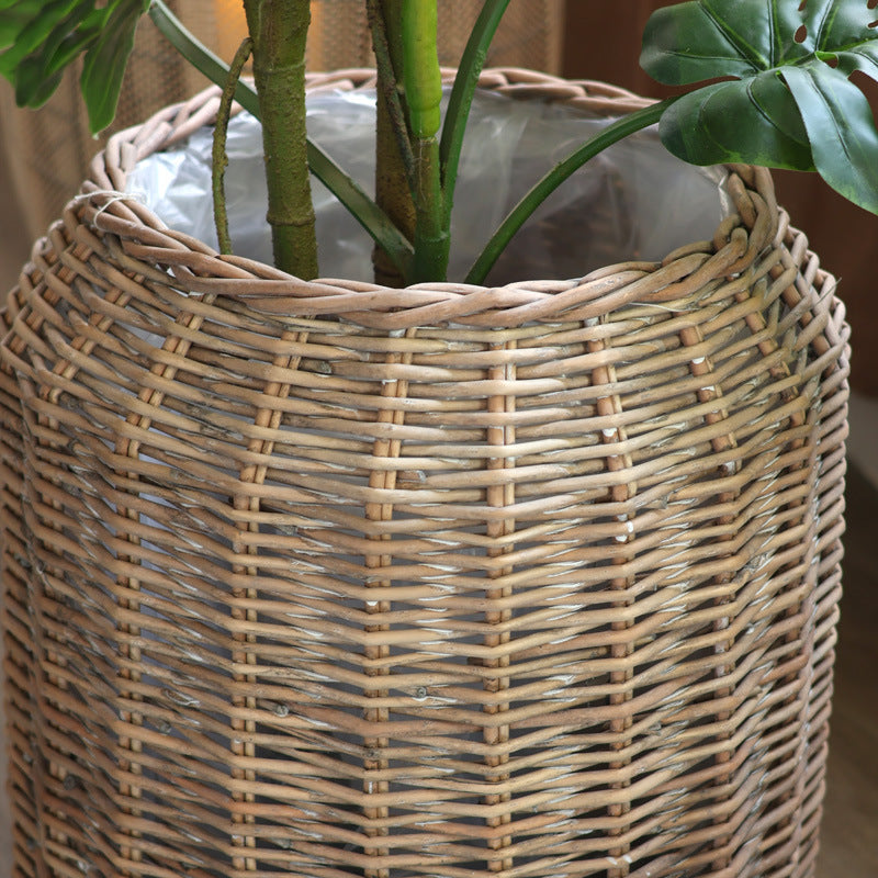 Stylish laundry basket made of braided natural material