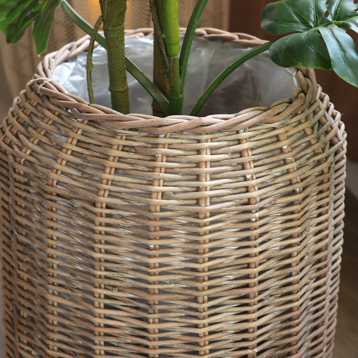 Stylish laundry basket made of braided natural material
