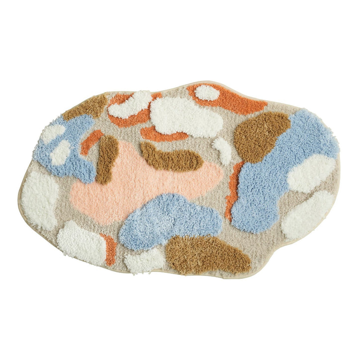 High-pile bathroom rug in organic shape with abstract textured pile