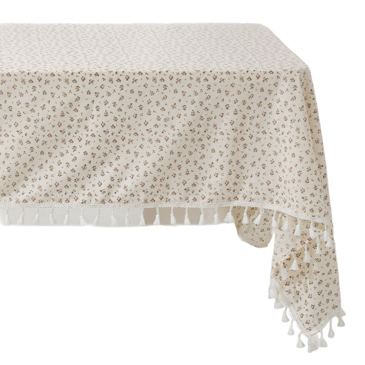 Rectangular tablecloth with floral Millefleurs print and cotton tassels