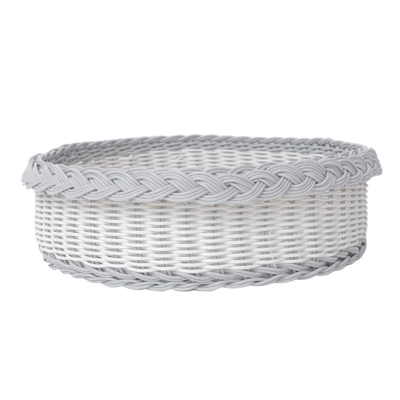Handwoven storage basket with decorative edge