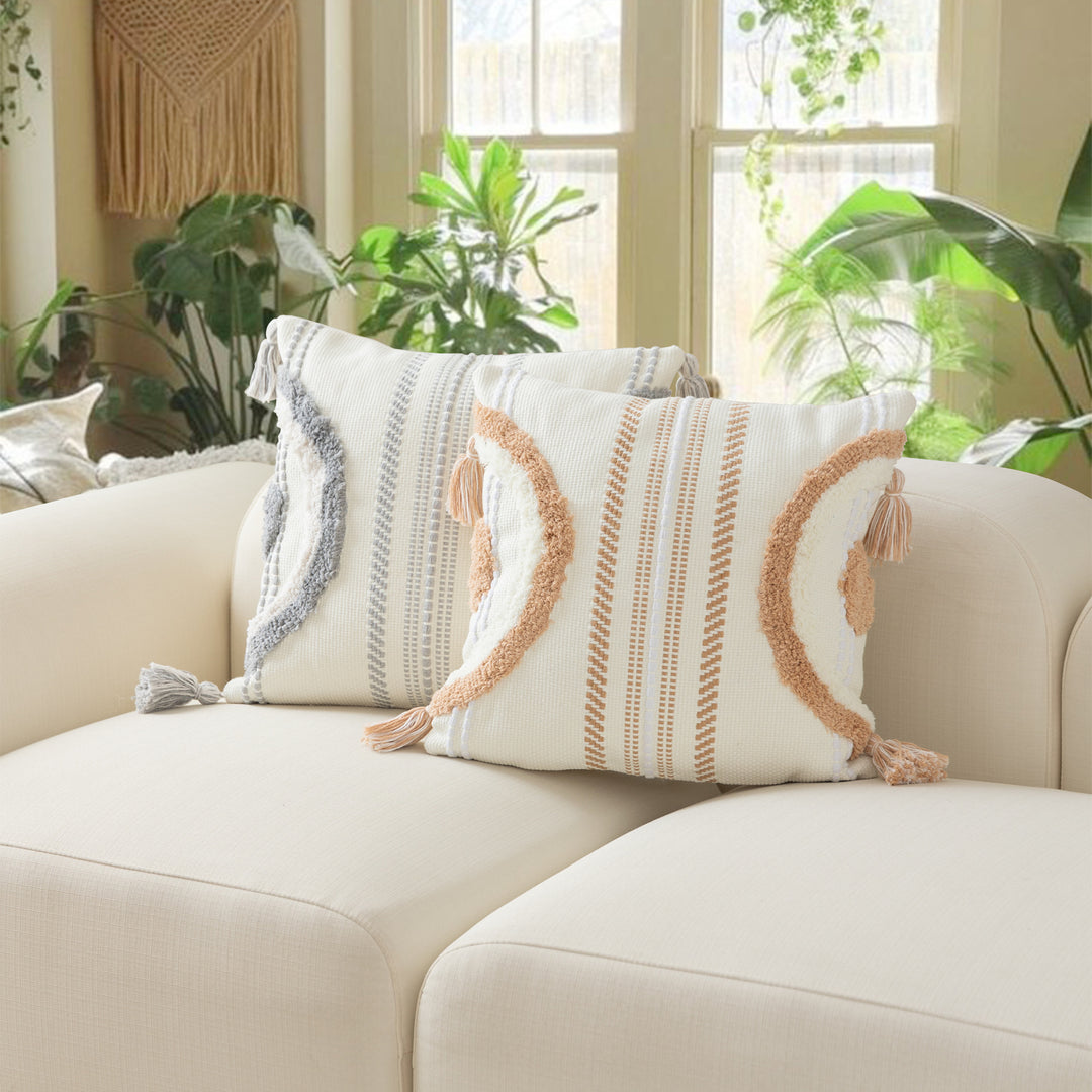 Woven decorative cushion cover with semi-circular tuft appliqué, fringe tassels, and concealed zipper
