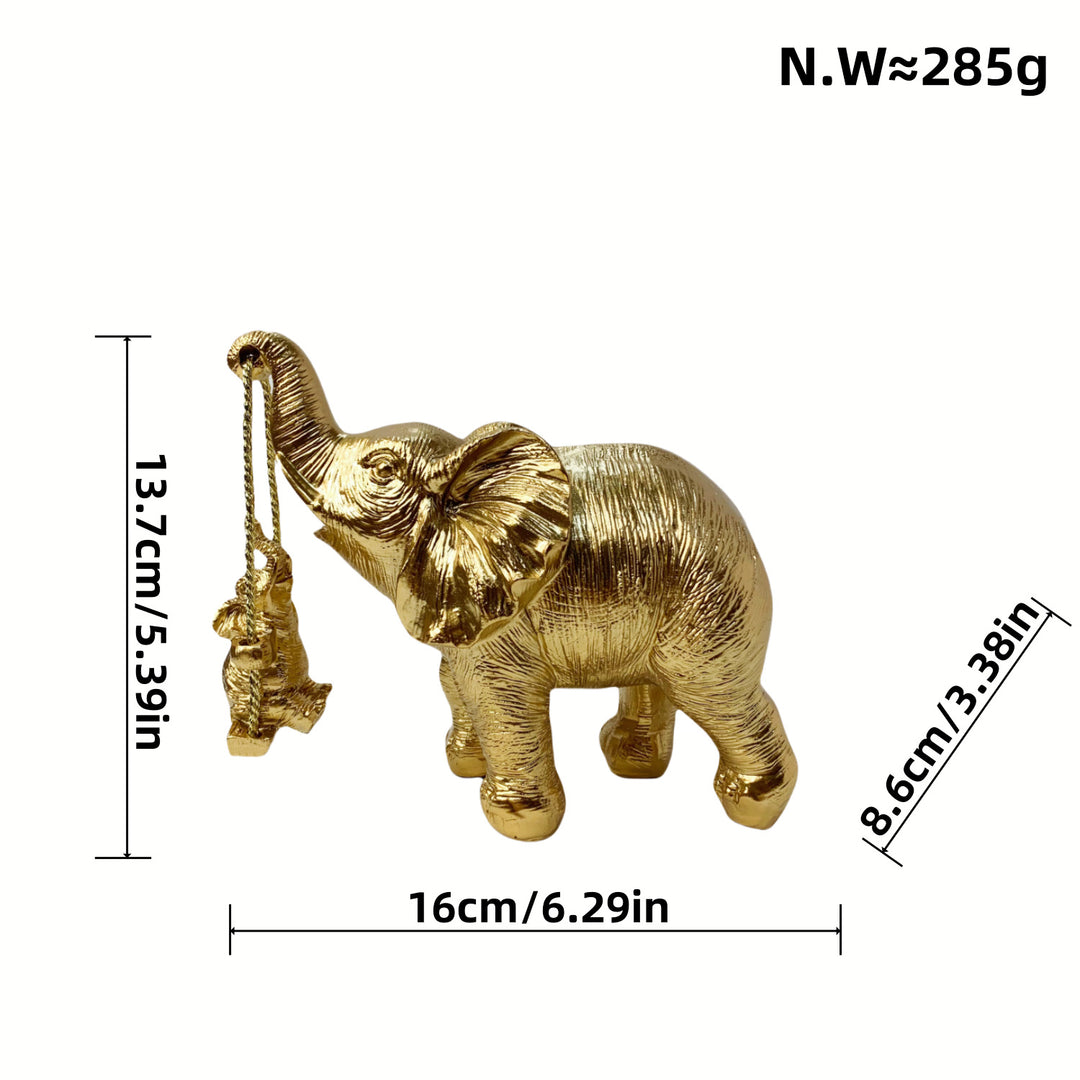 Decorative elephant figurine with child