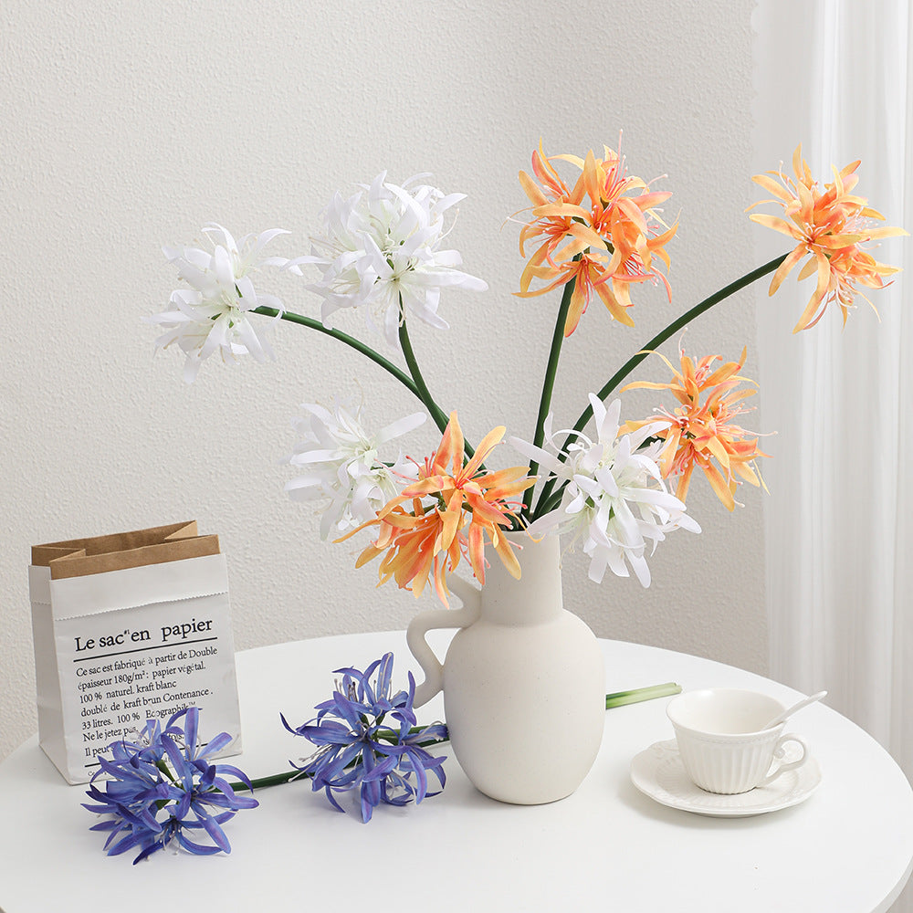 Artificial blossom branch with delicate flowers