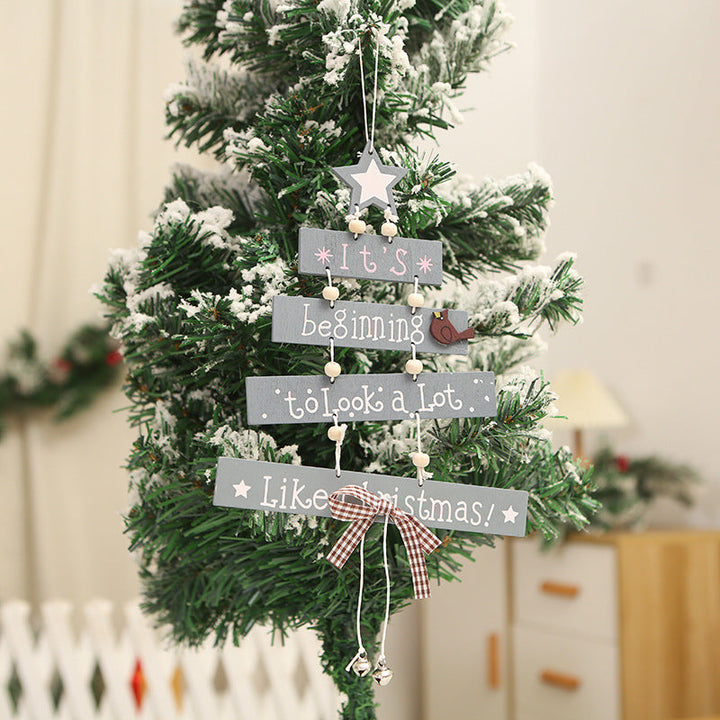 Decorative wooden sign with Christmas greeting