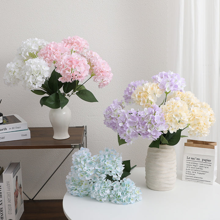 Decorative artificial flower arrangement