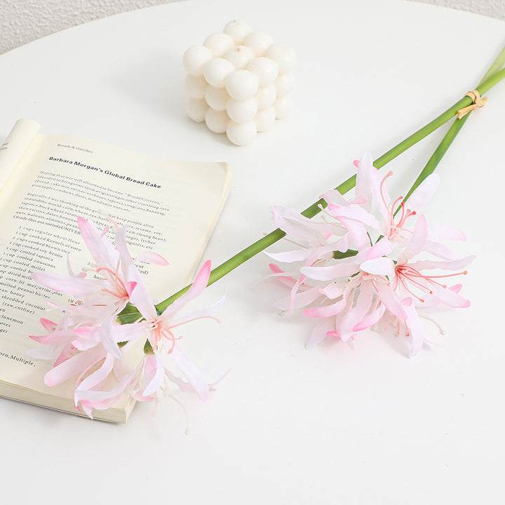 Artificial blossom branch with delicate flowers