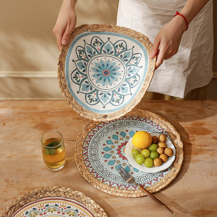 Round woven table mat made of jute with mandala cotton overlay