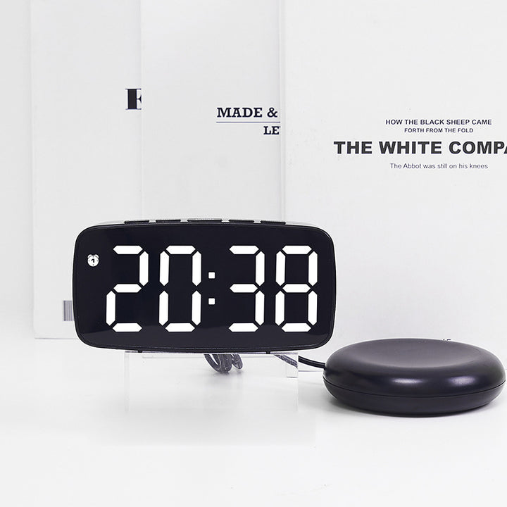 Digital alarm clock with LED display and temperature function