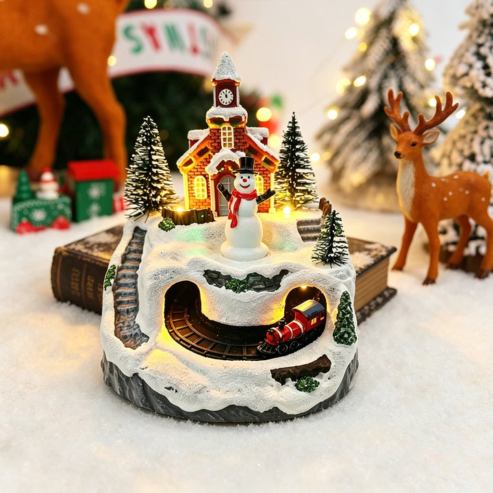 Movable Christmas village with lights and snowman