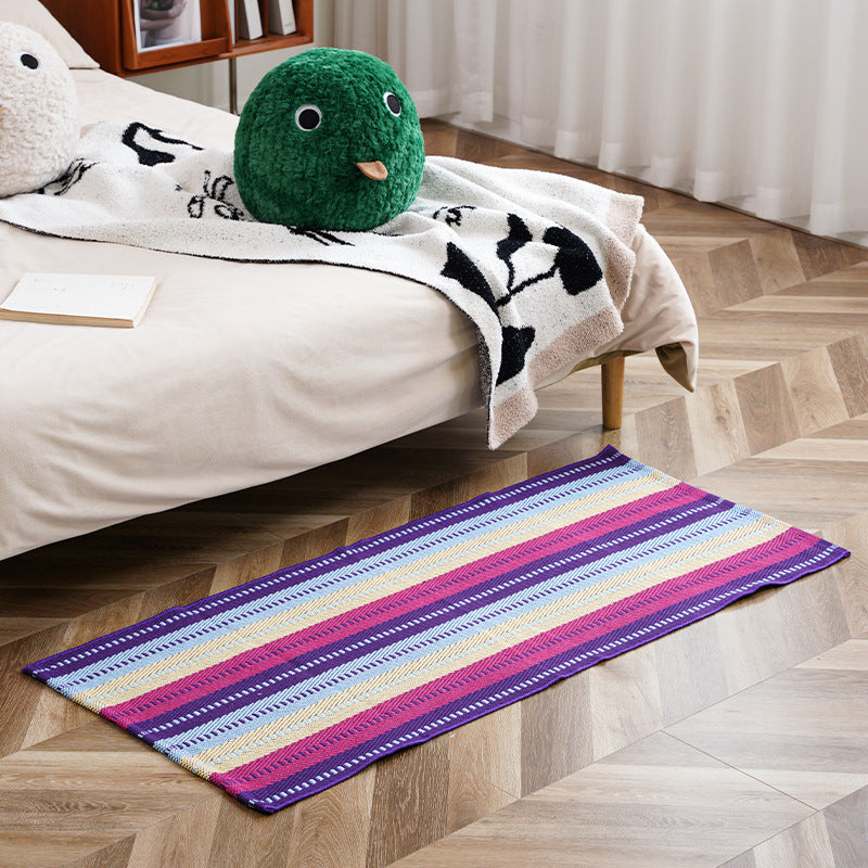Flat-woven runner rug with check pattern and decorative border stripe
