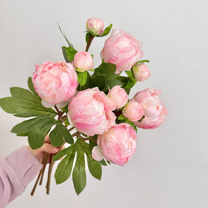 Artificial peony bouquet with delicate flowers and leaves