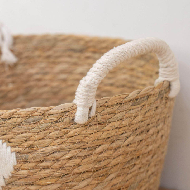 Handwoven storage basket with heart design
