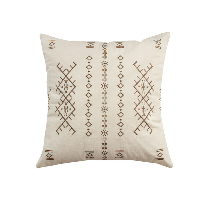 Square decorative cushion with fine relief embroidery in ethnic design and removable cover