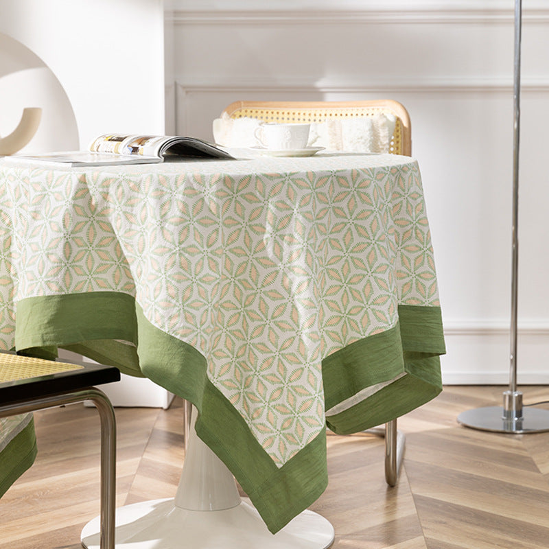Cotton tablecloth with graphic all-over pattern and contrasting hem edge