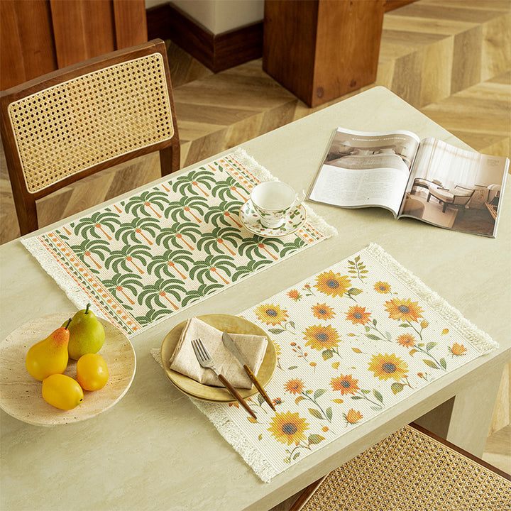 Rectangular woven rug in tropical palm pattern with flat weave and fringes