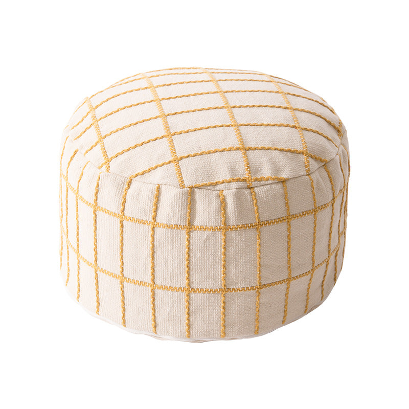Round seat pouf with knitted check cover and shape-stable inner core