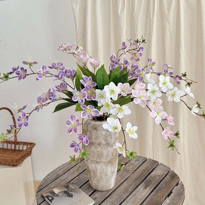 Artificial flower branch with elegant design