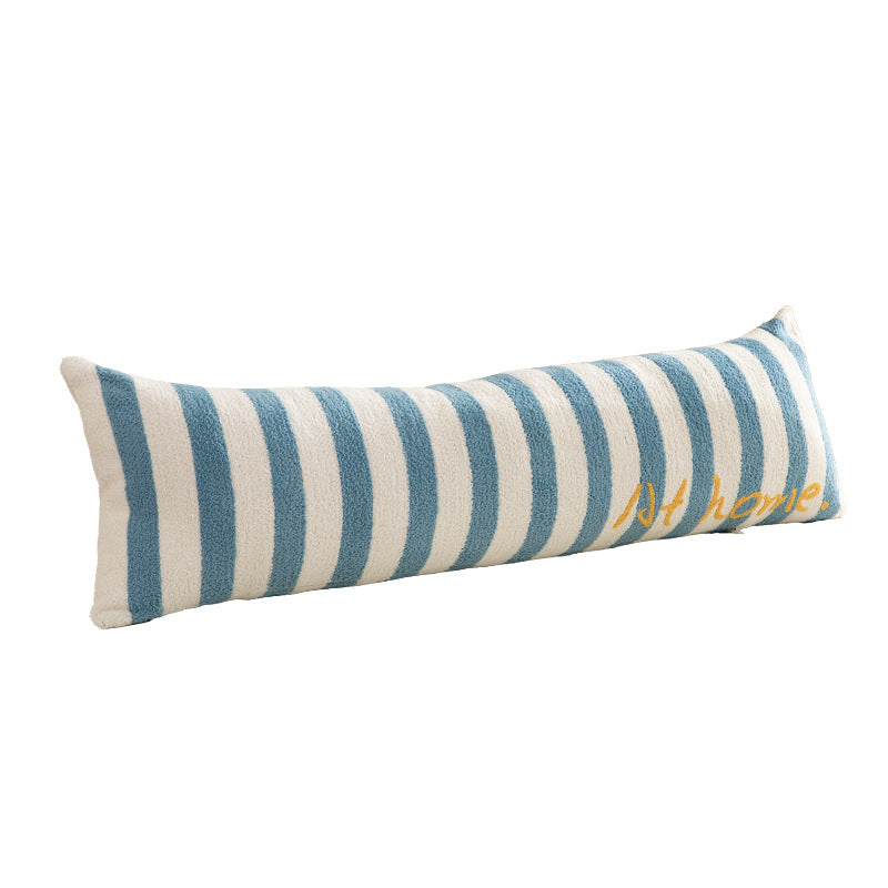 Elongated bench and windowsill cushion with nautical stripe texture and embroidered lettering