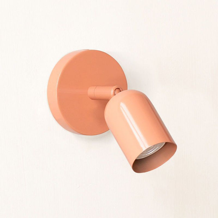 Adjustable directional metal wall spotlight with swiveling head