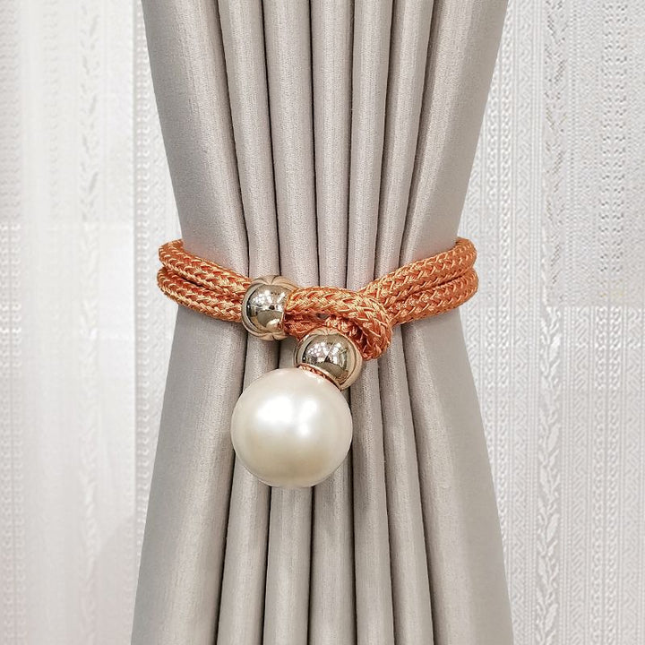 Elegant curtain tieback with decorative pearl