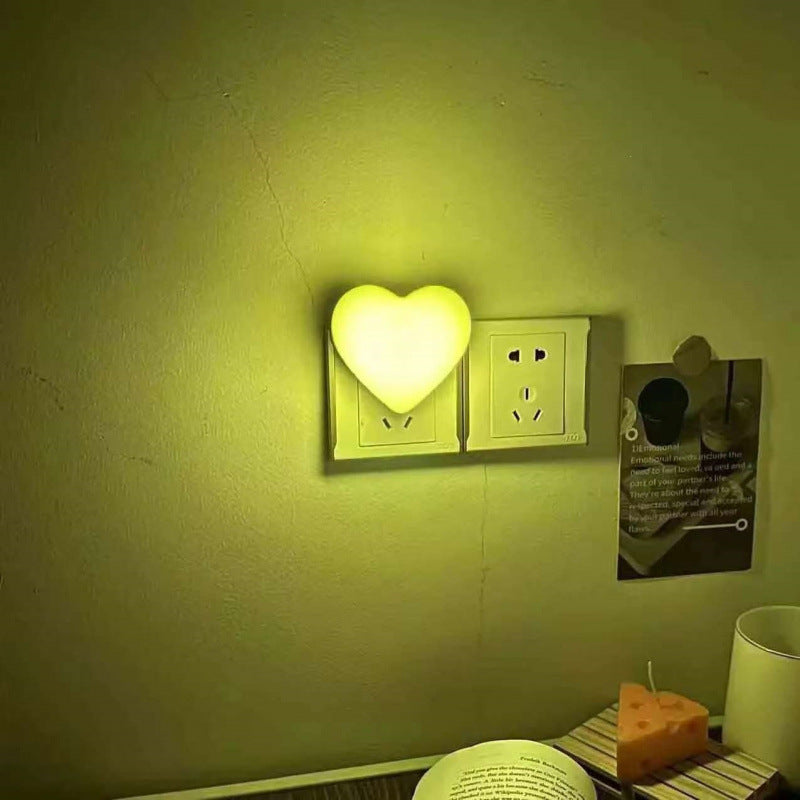 Heart-shaped plug-in ambient night light with soft LED lighting