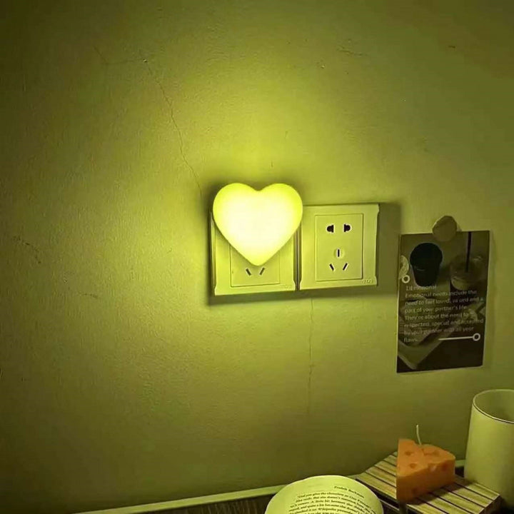 Heart-shaped plug-in ambient night light with soft LED lighting