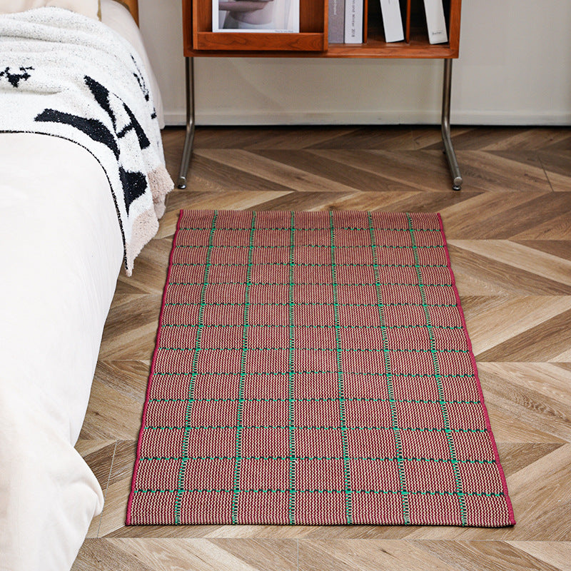 Flat-woven runner rug with check pattern and decorative border stripe