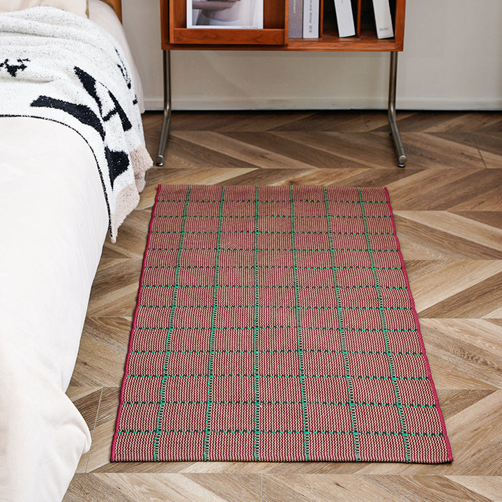 Flat-woven runner rug with check pattern and decorative border stripe