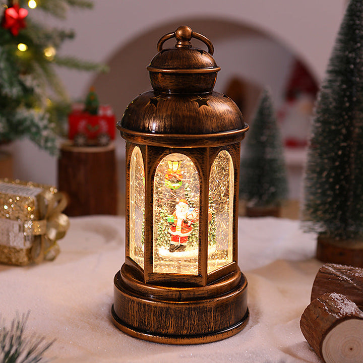 Illuminated Christmas lantern with Santa Claus scene