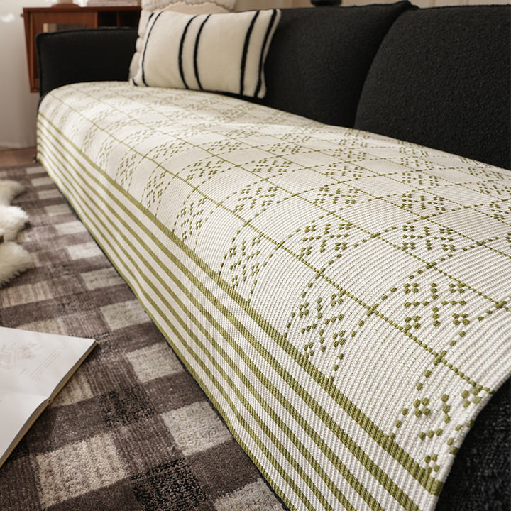 Jacquard-woven cotton kitchen towel with check pattern and striped trim