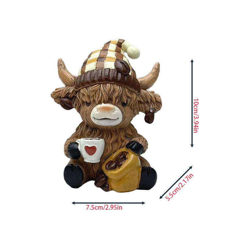 Decorative figure of a Highland cow with accessories
