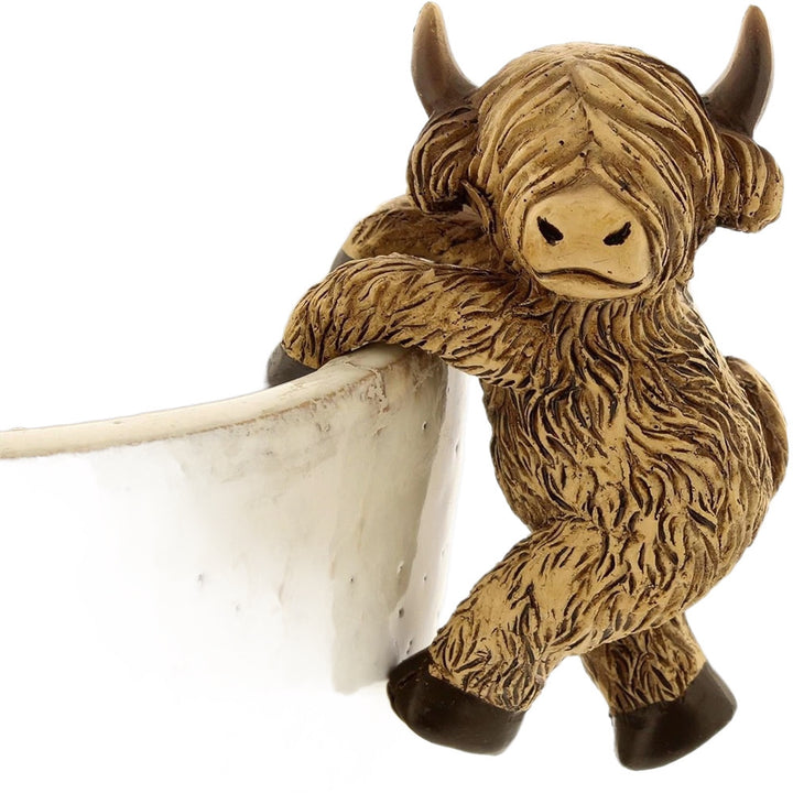 Playful Highland Cow Figurine