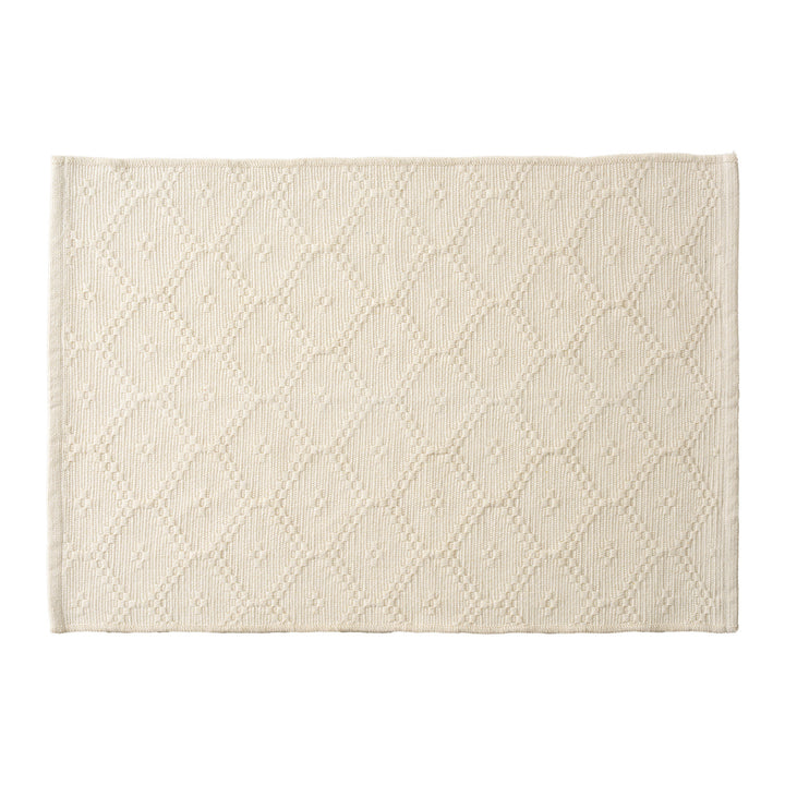 Woven square placemat with embossed diamond pattern