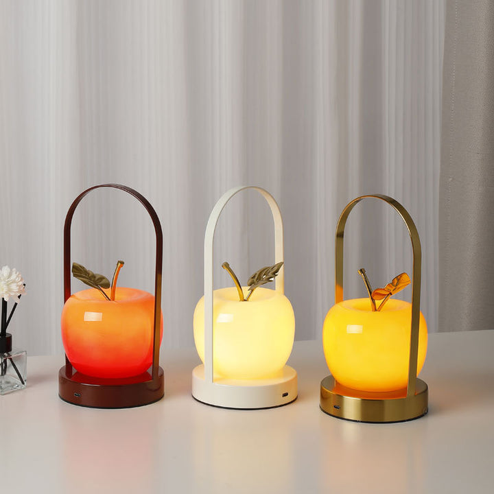 Ceramic apple-shaped ambient table lamp with brass handle
