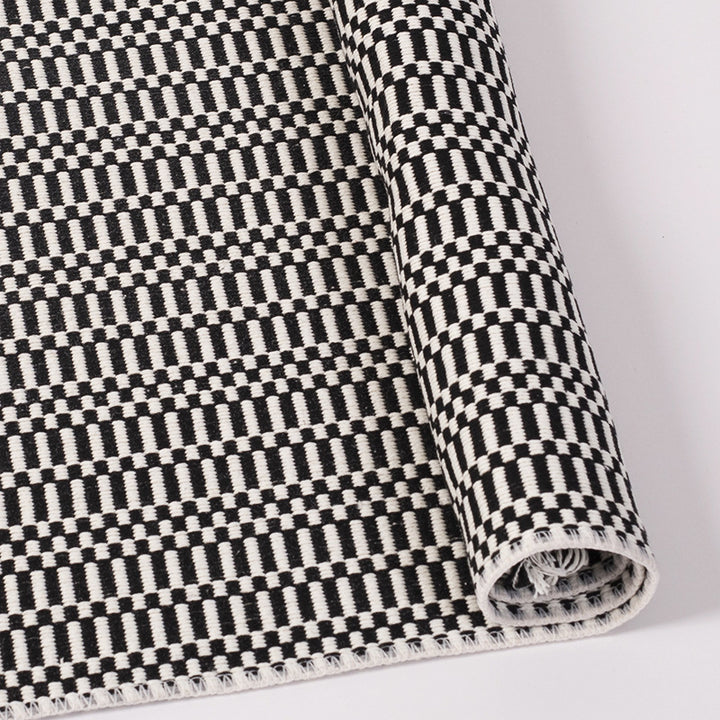 Flat-woven cotton rug runner with geometric check pattern and easy-care surface