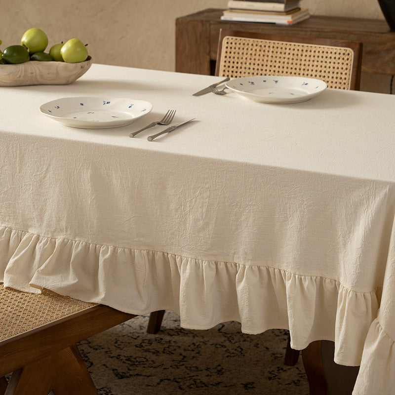 Rectangular decorative tablecloth with gathered flounce and light linen look