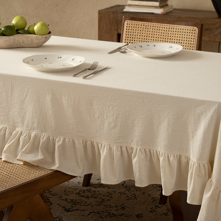 Rectangular decorative tablecloth with gathered flounce and light linen look