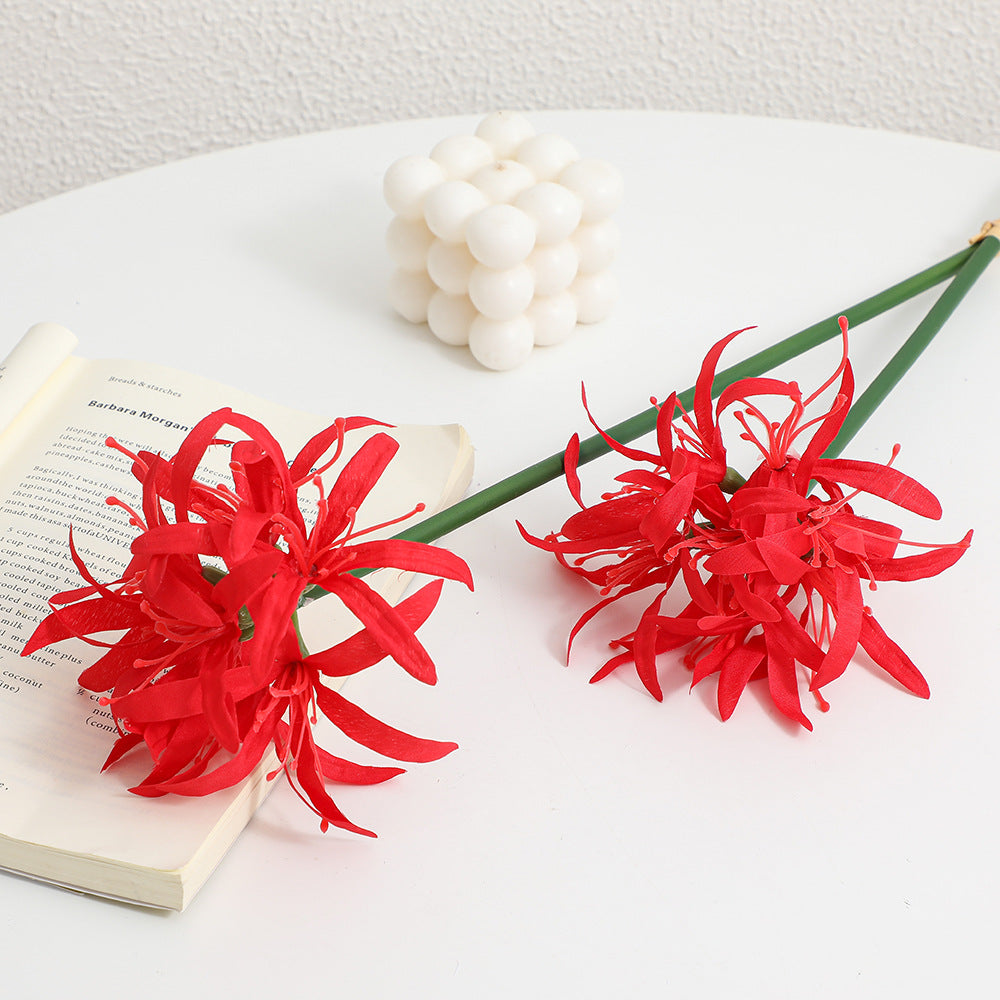 Artificial blossom branch with delicate flowers