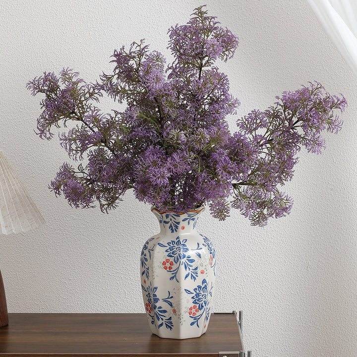 Artificial flower branch with delicate purple flowers