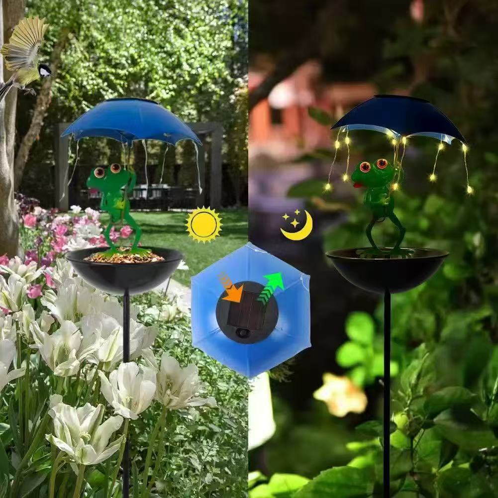 Decorative garden birdhouse stake with protective umbrella and playful frog decoration