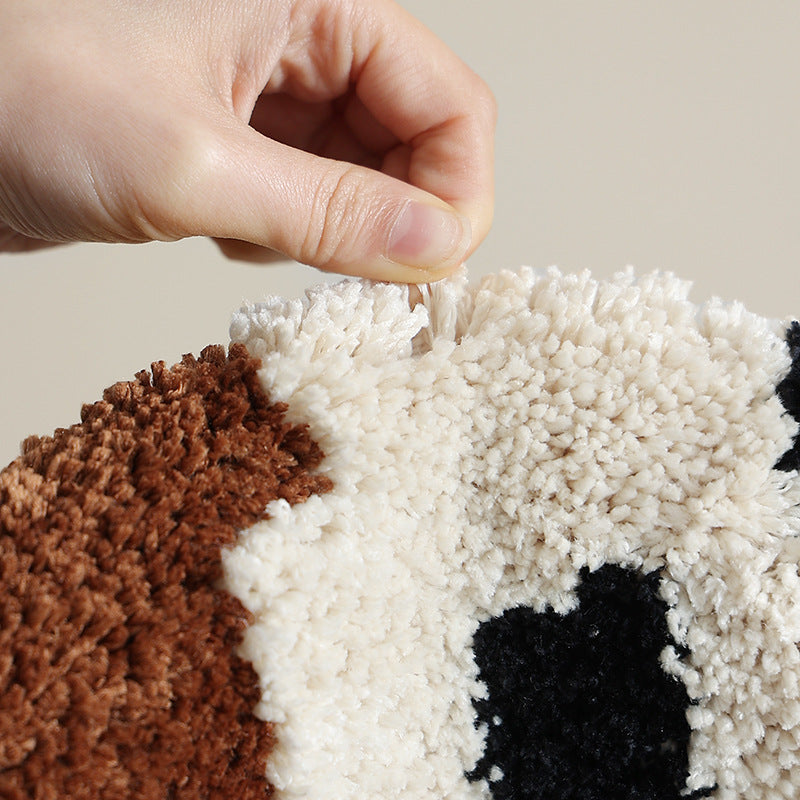 Rectangular bath mat with playful dog motif and soft tufting