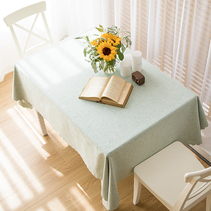 Rectangular tablecloth in linen look with wavy arc edge