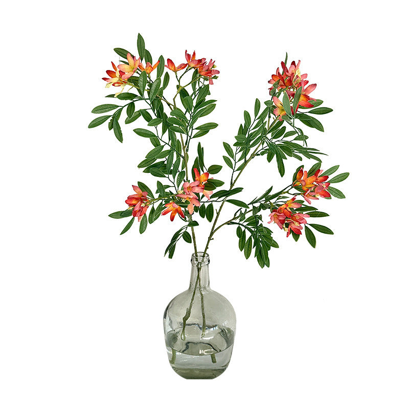 Decorative artificial flower branch with delicate flowers