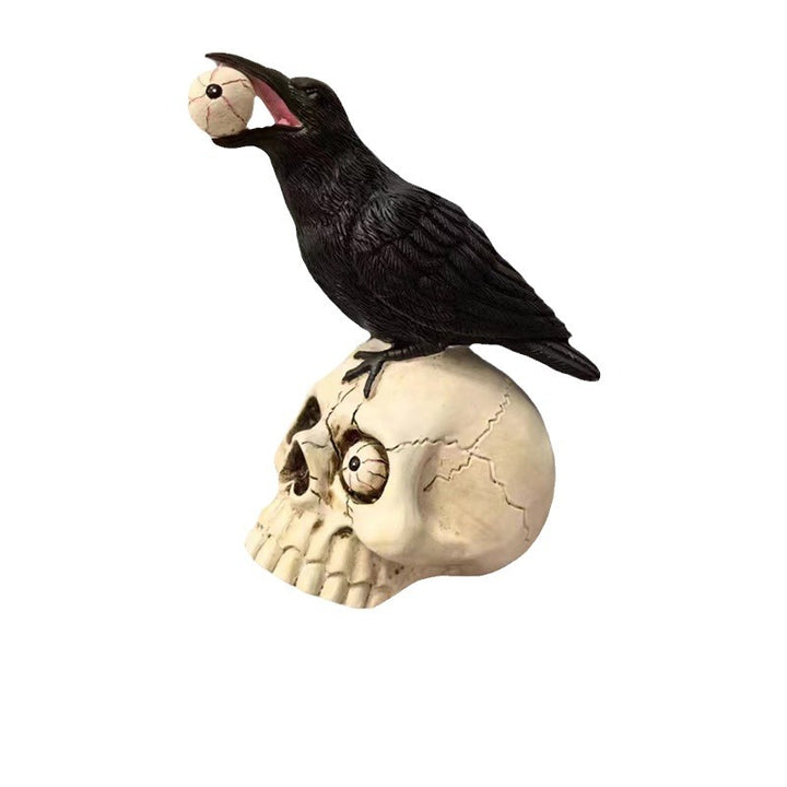 Decorative figure with raven on skull